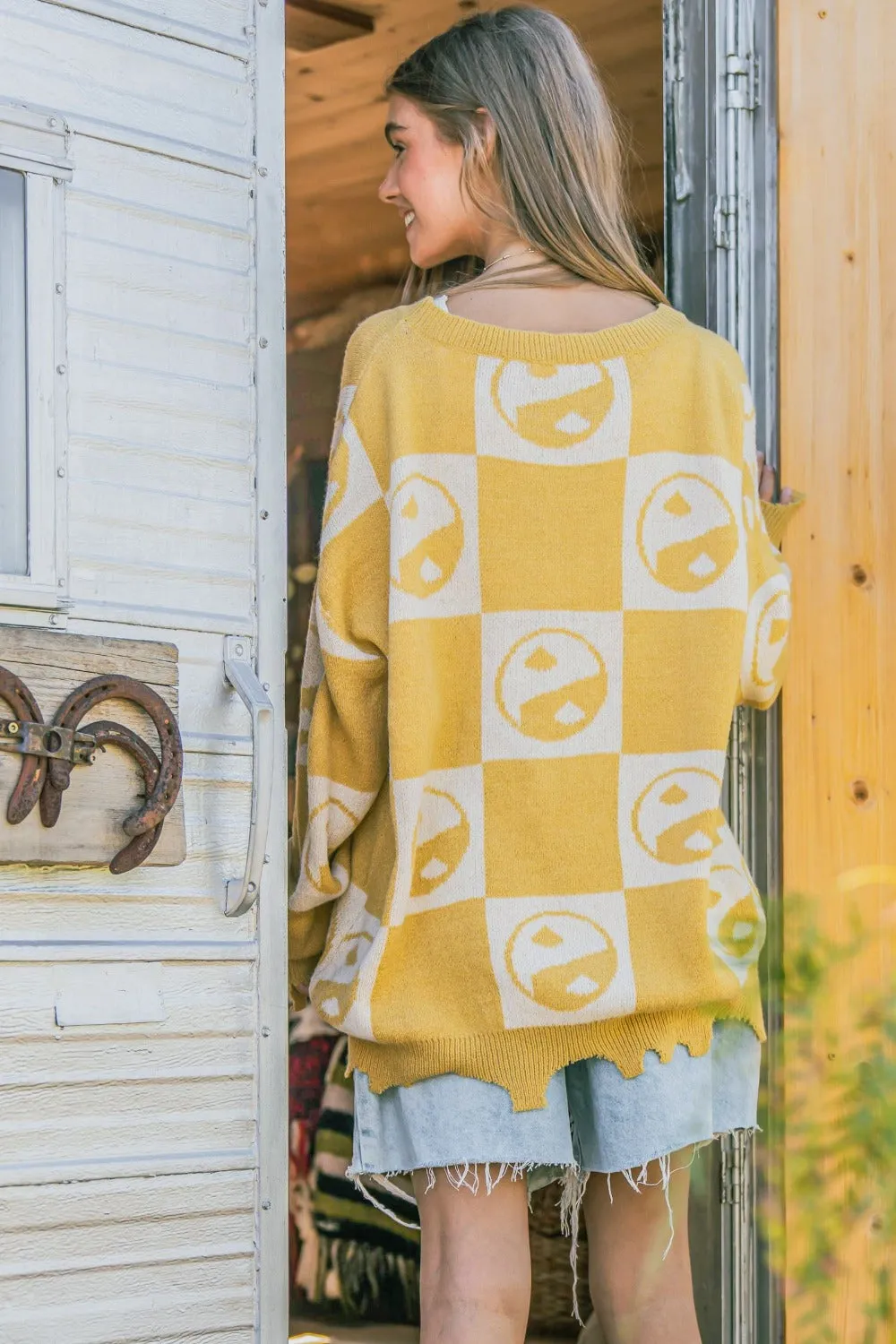 Checkerboard Sweater with Yin Yang Pattern